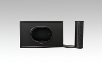 Black wall-mounted WipeWorks bathroom dispenser for flushable wipes and toilet paper without toilet paper or wipes.